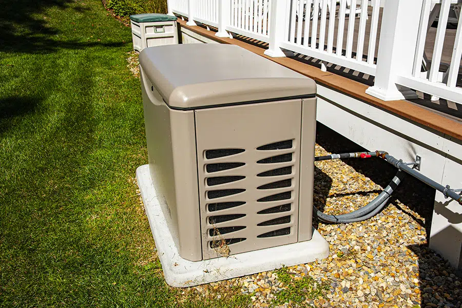 Whole-home generator unit installed beside a residential property in Wilson, NC.