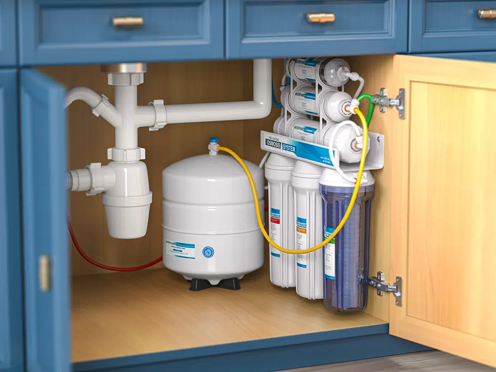 Under-sink reverse osmosis water filtration system installed in a Wilson, NC kitchen.
