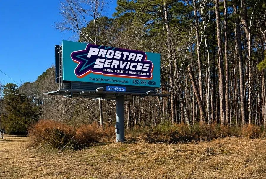 Roadside billboard for Prostar Services advertising HVAC, plumbing, and electrical services in the Wilson, NC area