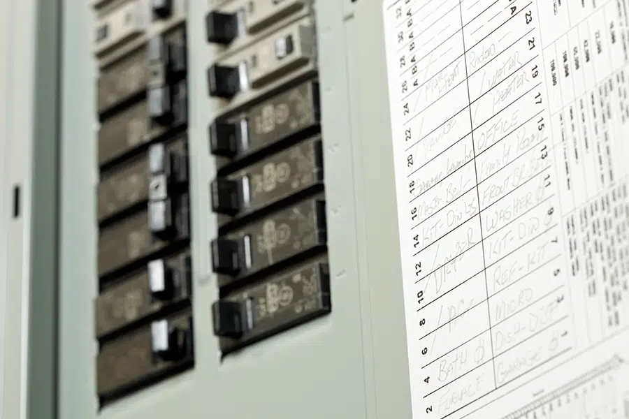 Electrical breaker panel with labeled circuits inside a home near Wilson, North Carolina.